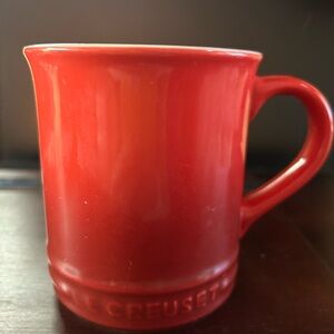 Le Creuset Red Vancouver Mug holds 14oz.